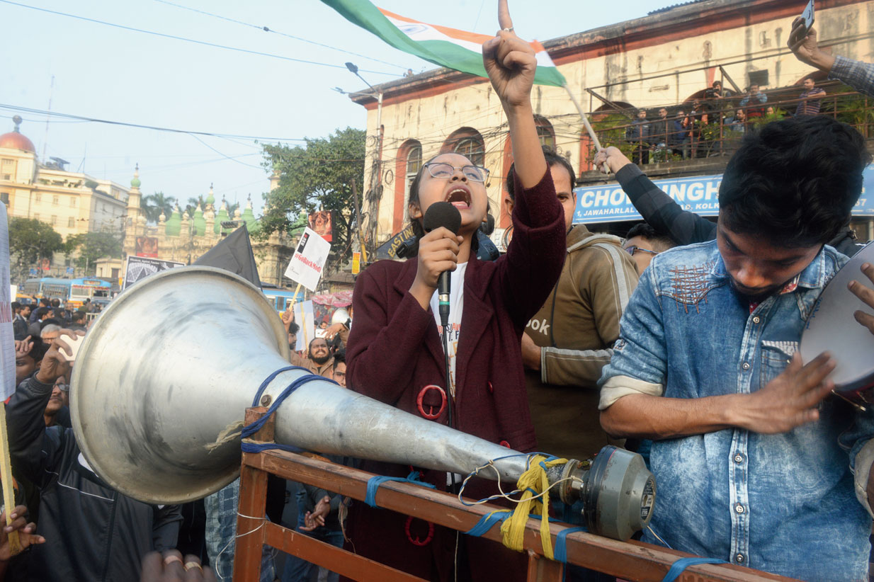A protester shouts slogans at Esplanade
