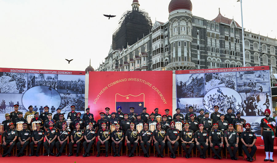 Army personnel poses for a group photograph after 50 medals including 23 gallantry medals and 21 GOC-in-C citations were presented to the awardees during Southern Command Investiture Ceremony, at Gateway of Indiain Mumbai