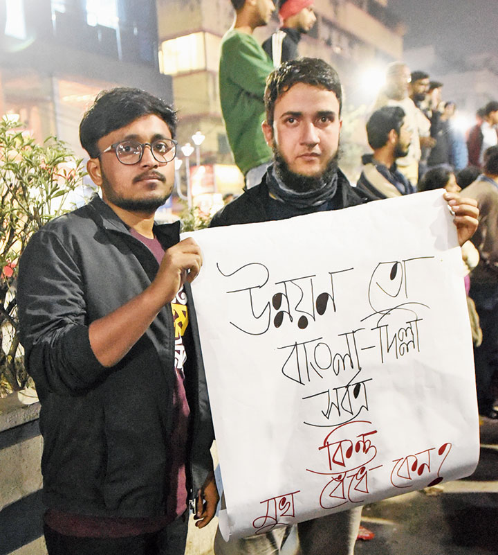 Majid Lone (right) 22, is from Kashmir and is pursuing graduation from a college in Calcutta
He walked in the rally from College Street to Jorasanko