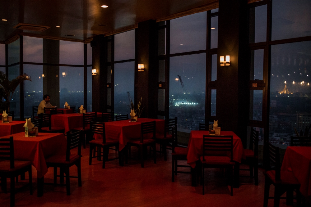 A nearly empty restaurant once popular among tourists for the panoramic view of downtown Yangon, Myanmar, March 19, 2020